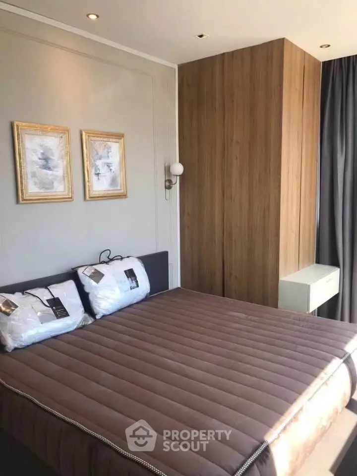 Modern bedroom with stylish decor and natural light