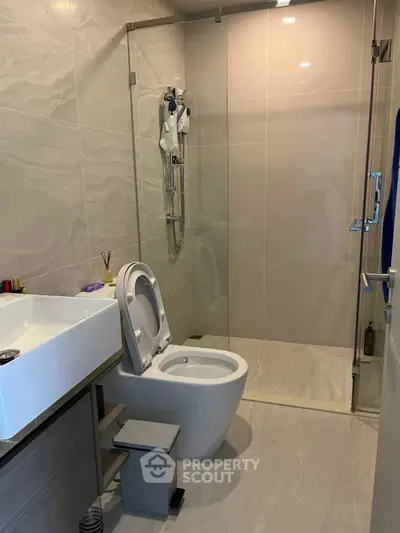 Modern bathroom with sleek design and glass shower enclosure