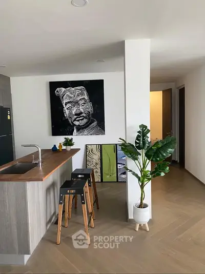 Modern kitchen with wooden island and stylish decor