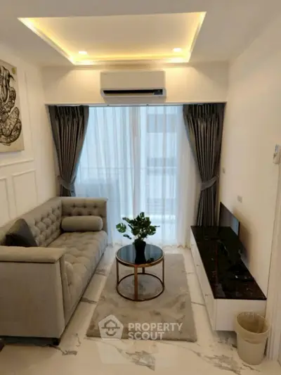 Elegant living room with modern decor and natural light