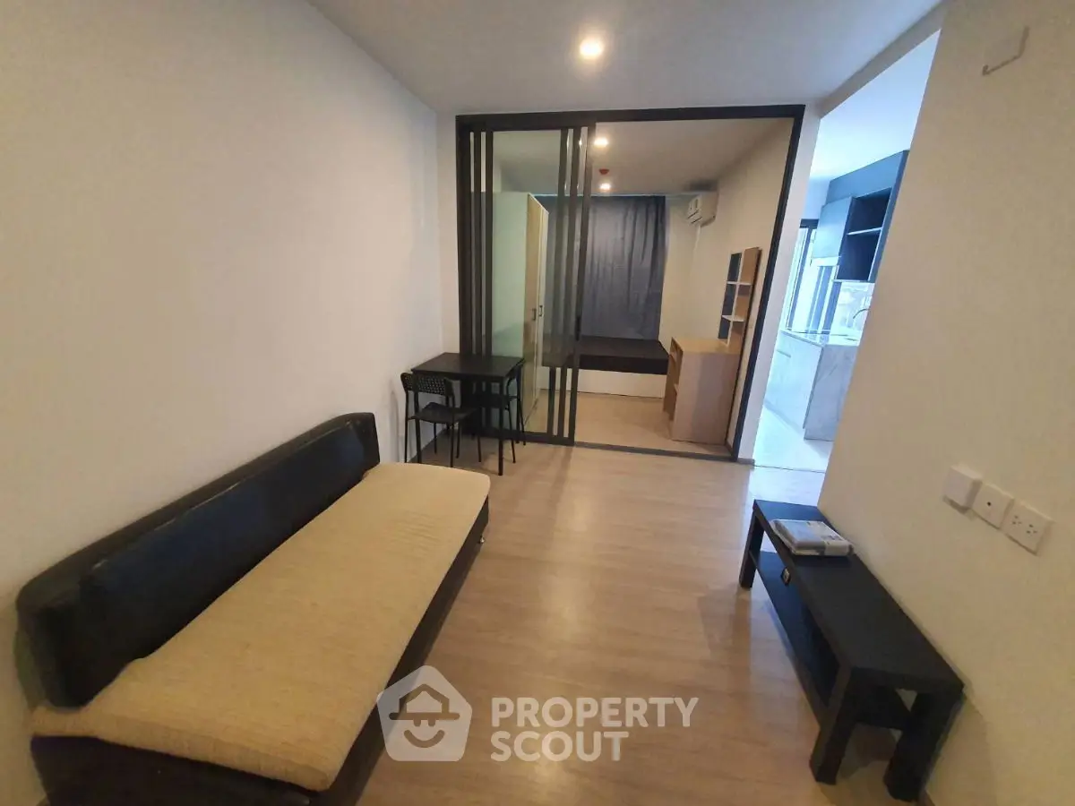 Modern studio apartment with open layout and stylish furnishings