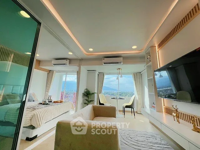 Luxurious living room with stunning view and modern decor in high-rise apartment