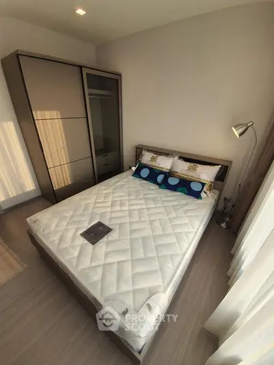 Cozy bedroom with modern wardrobe and stylish decor
