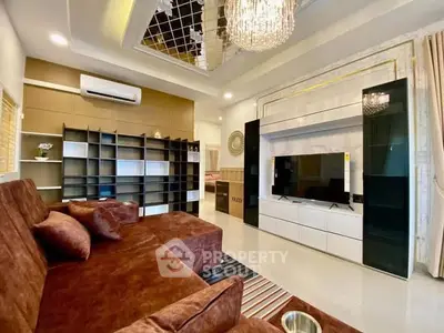 Luxurious living room with modern decor and plush seating