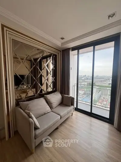 Modern living room with elegant mirror wall and city view balcony.