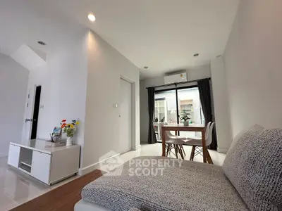 Modern living room with stylish furniture and natural light in a contemporary home.