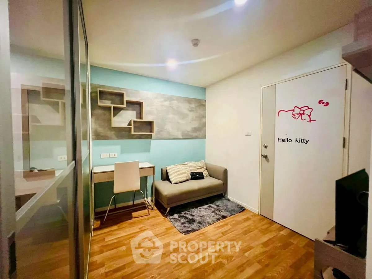 Charming study room with modern decor and cozy seating, perfect for productivity and relaxation.