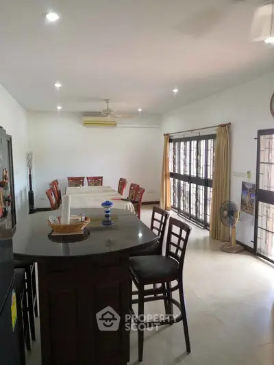 Spacious dining area with modern decor and natural light