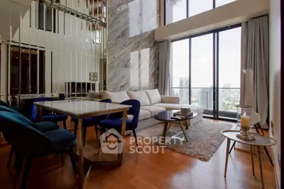 Luxurious modern living room with floor-to-ceiling windows and stunning city view.
