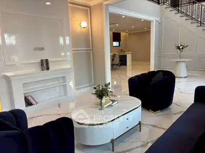 Luxurious modern living room with elegant furniture and marble flooring