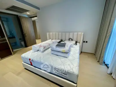 Modern bedroom with stylish bed and natural light