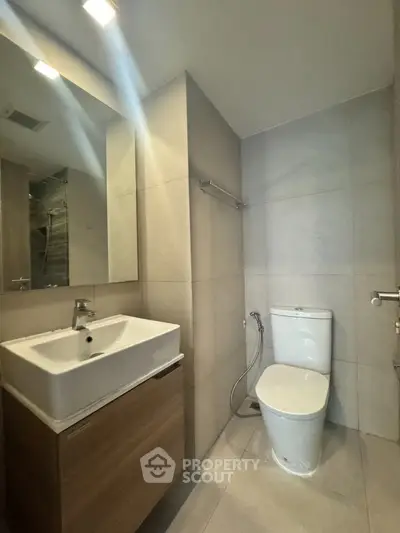Modern bathroom with sleek fixtures and neutral tones