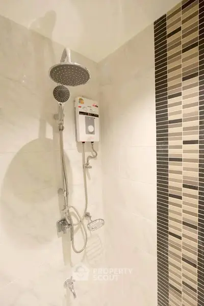 Modern bathroom with stylish shower and elegant tile design