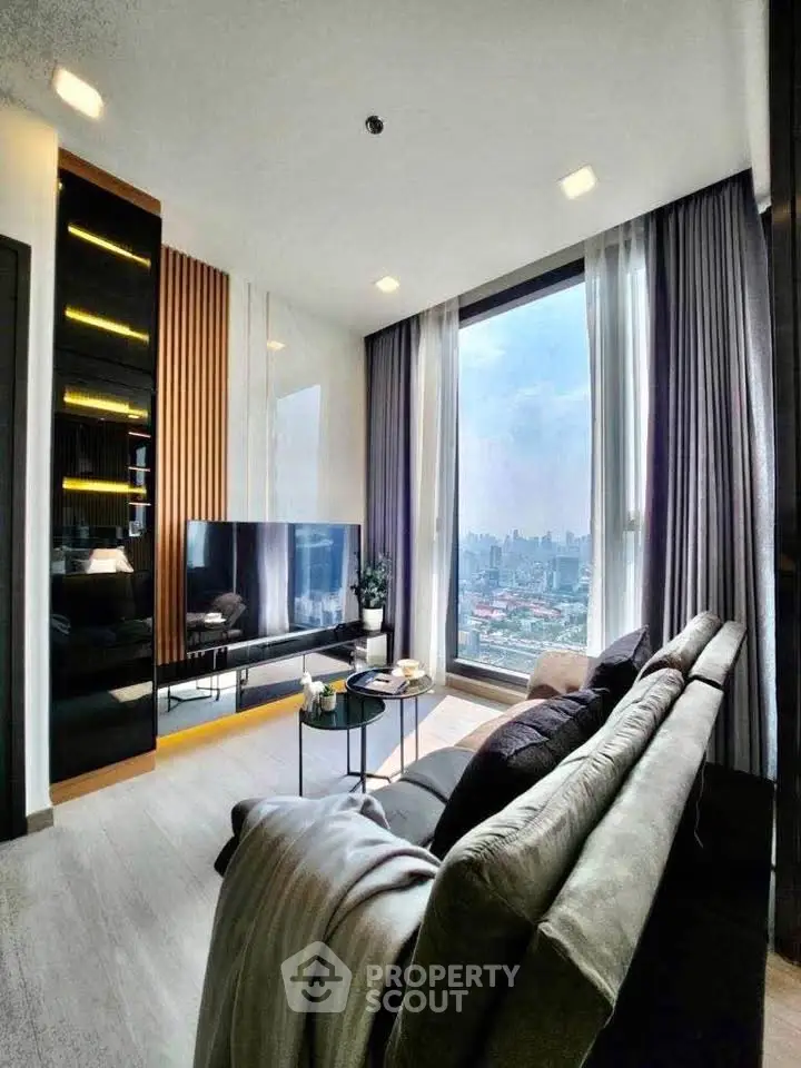 Modern living room with panoramic city view and sleek decor