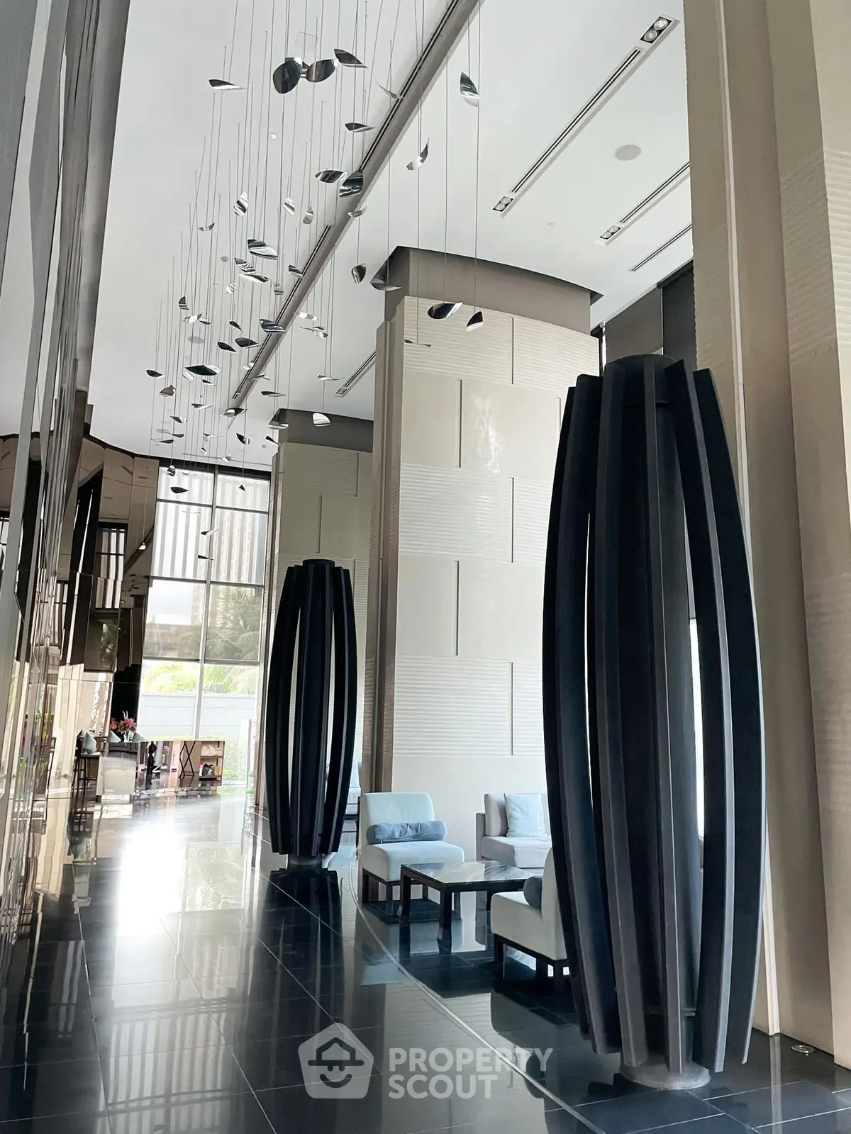 Luxurious modern building entrance with sleek design and elegant decor