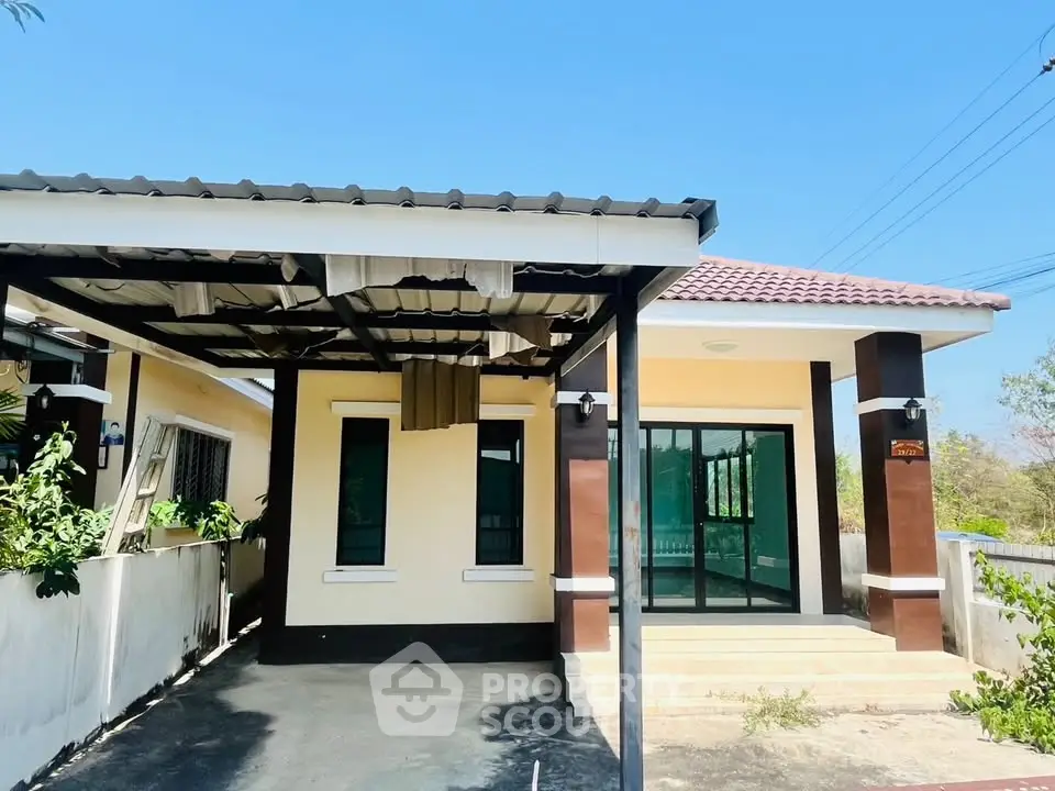 Charming single-story home with carport and modern exterior design.