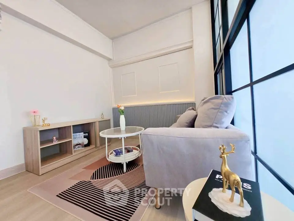 Stylish modern living room with cozy sofa and elegant decor