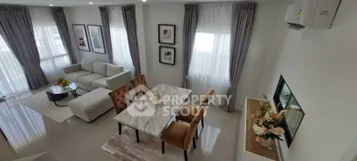 Spacious modern living room with elegant dining area and stylish decor