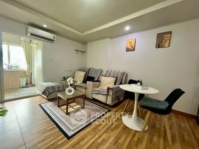 Cozy living room with modern decor and comfortable seating