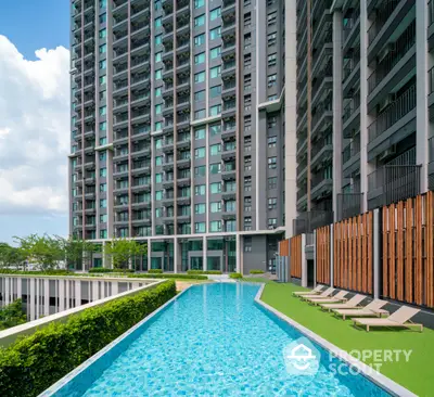 Luxurious high-rise apartment with stunning rooftop pool and modern amenities.