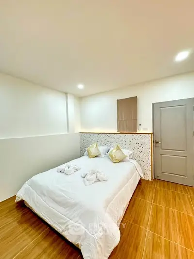 Cozy bedroom with modern design and wooden flooring