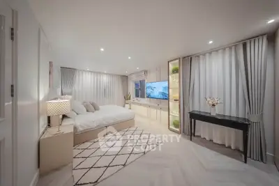 Luxurious modern bedroom with elegant decor and ambient lighting