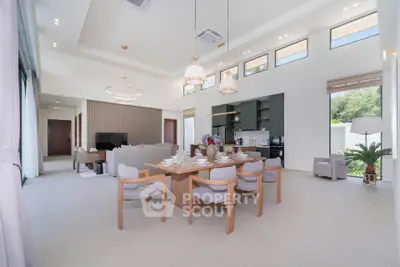 Spacious modern living and dining area with elegant decor and natural light
