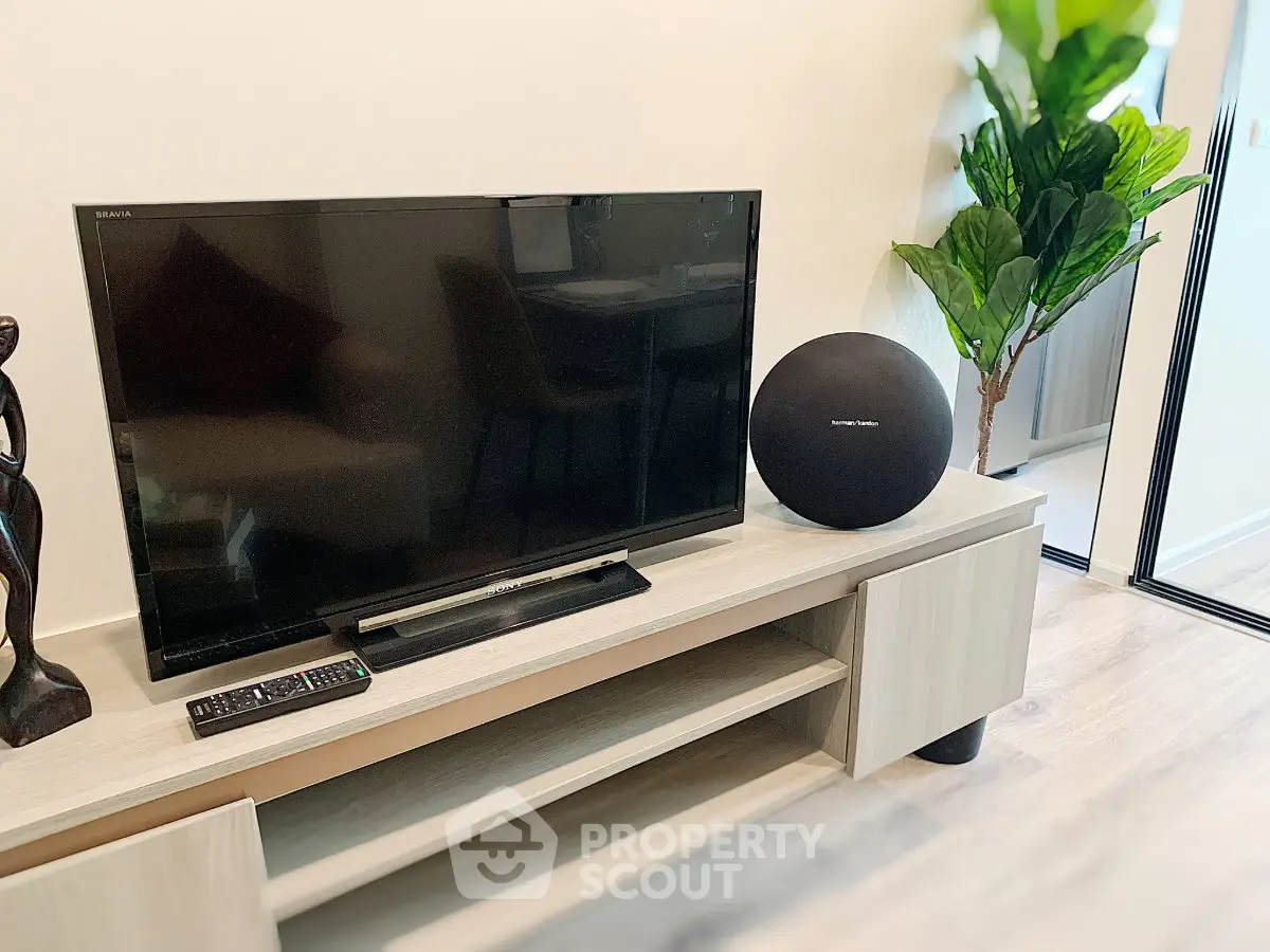 Modern living room with sleek TV setup and stylish decor