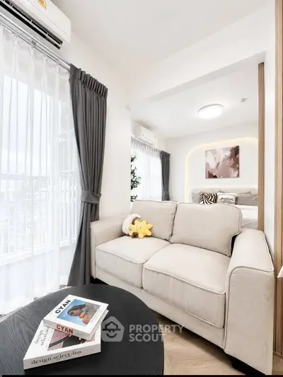 Modern living room with cozy sofa and stylish decor in a bright apartment
