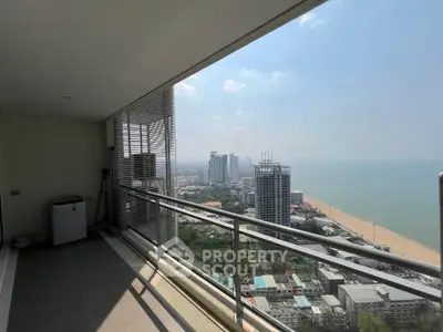 Stunning high-rise balcony with panoramic ocean and city views