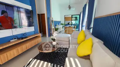 Spacious modern living room with stylish decor and open kitchen layout