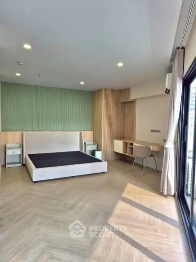 Spacious modern bedroom with elegant design and natural light