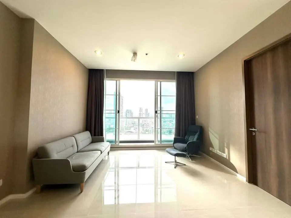 Spacious living room with modern furniture and city view