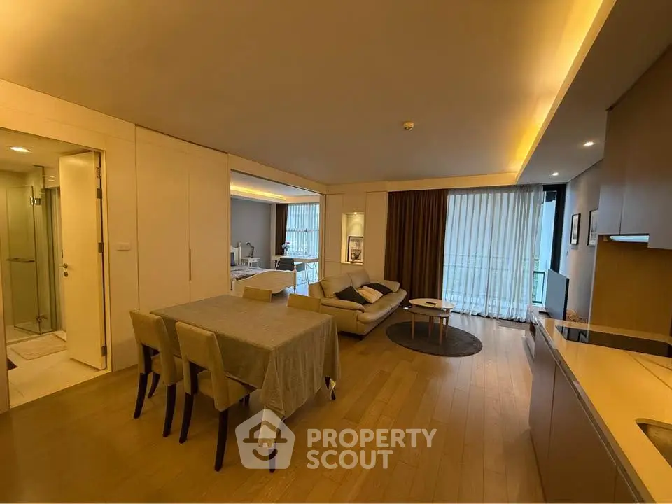 Spacious modern living room with dining area and open kitchen layout