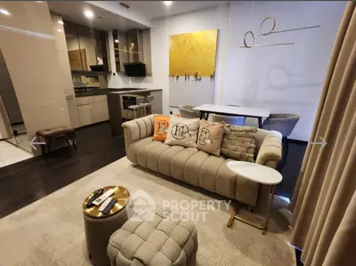 Luxurious modern living room with open kitchen and elegant decor