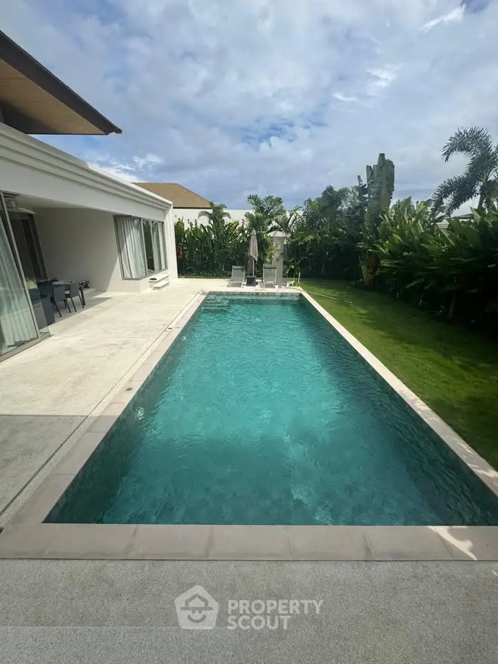Luxurious villa with private pool and lush garden, perfect for relaxation and entertaining.
