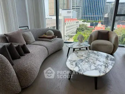 Luxurious modern living room with stylish furniture and stunning city view.