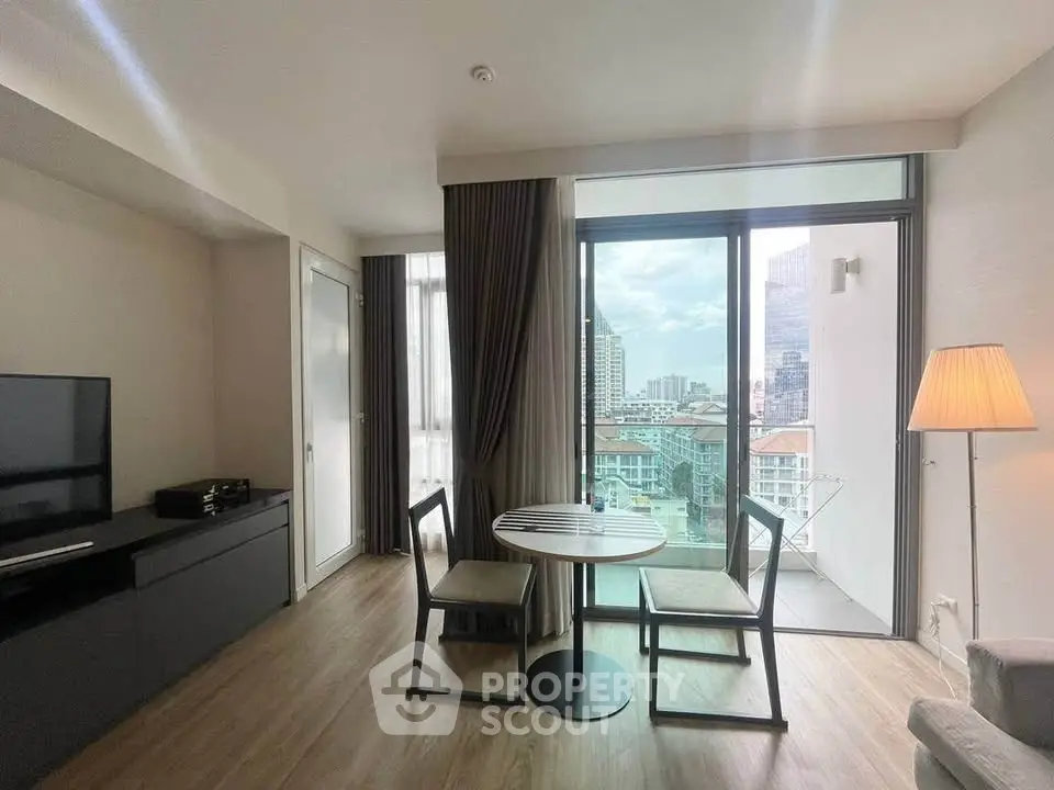 Modern living room with balcony view in urban apartment