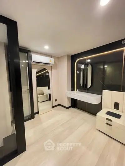 Modern bedroom with sleek design and built-in air conditioning unit