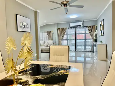 Spacious modern living room with elegant decor and natural light