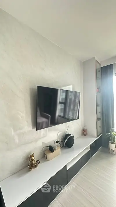 Modern living room with sleek TV setup and stylish decor