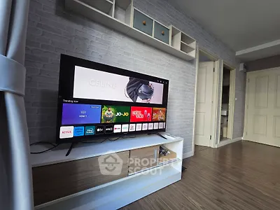 Modern living room with sleek TV setup and stylish decor
