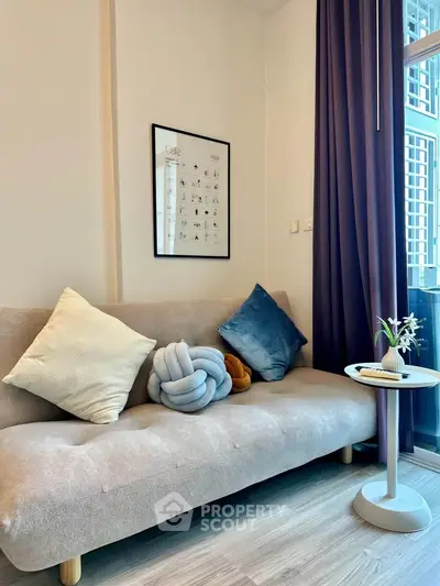 Cozy living room with modern sofa and stylish decor in a bright apartment