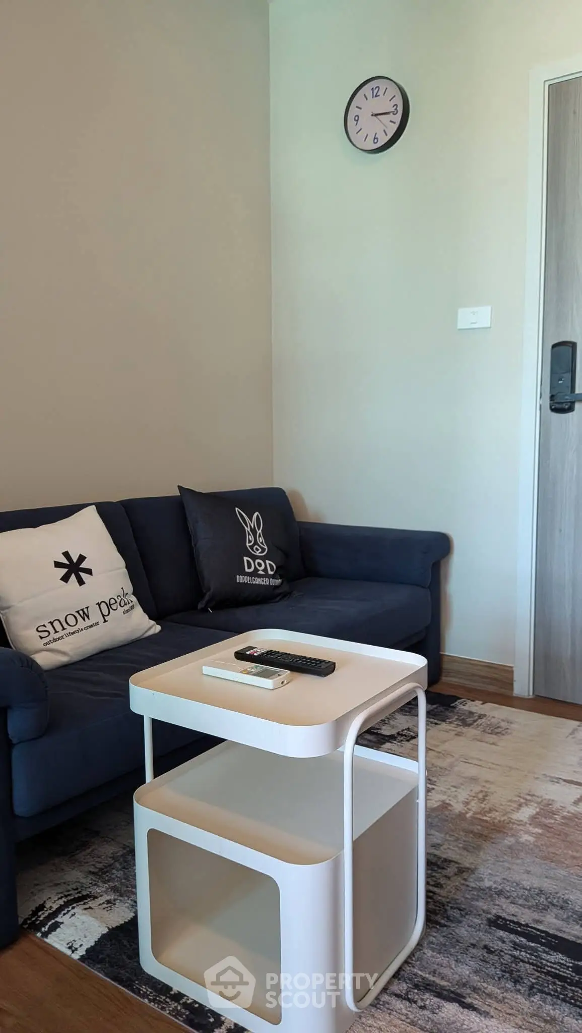 Cozy living room with modern decor and stylish furniture, perfect for relaxation and entertainment.