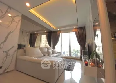 Luxurious living room with elegant marble accents and plush seating