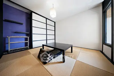 Elegant Japanese-style room with tatami mats and minimalist decor