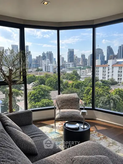 Luxurious living room with panoramic city view and modern furnishings