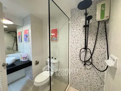 Modern bathroom with glass shower and stylish decor