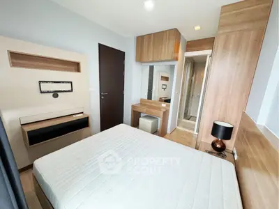 Modern bedroom with built-in wardrobe and ensuite bathroom