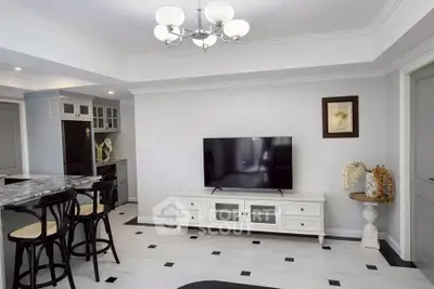 Modern living room with elegant decor and sleek TV setup